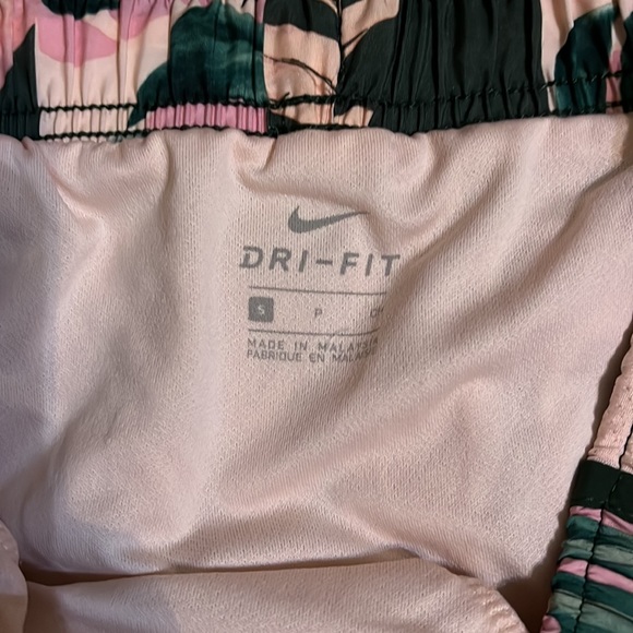 Like new, Nike dry-fit size small running shorts in a tropical print. - Picture 2 of 2